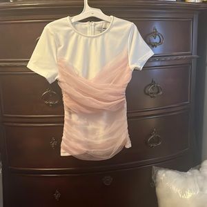 Whit and pink mesh shirt nicely fitted very faltering